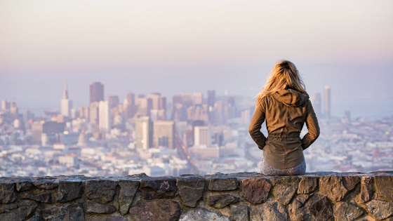 Women looking at a city