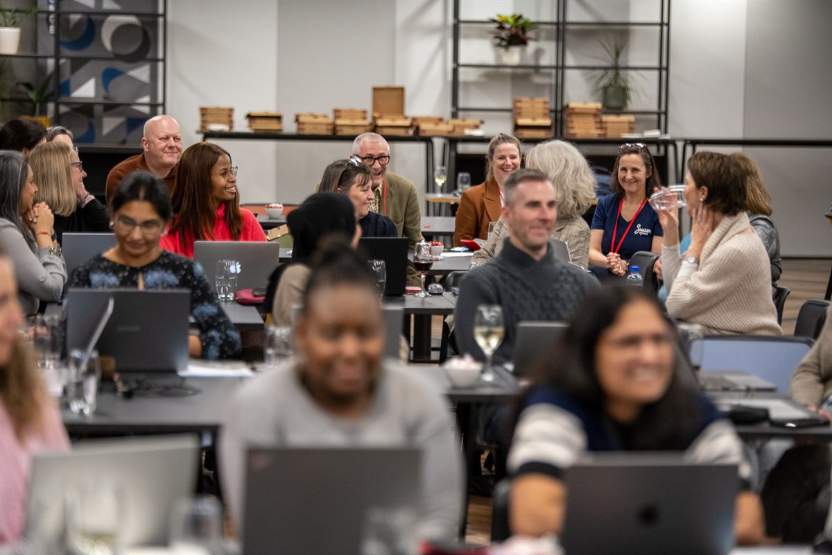 Learners at laptops during the Supermums AI Hackathon